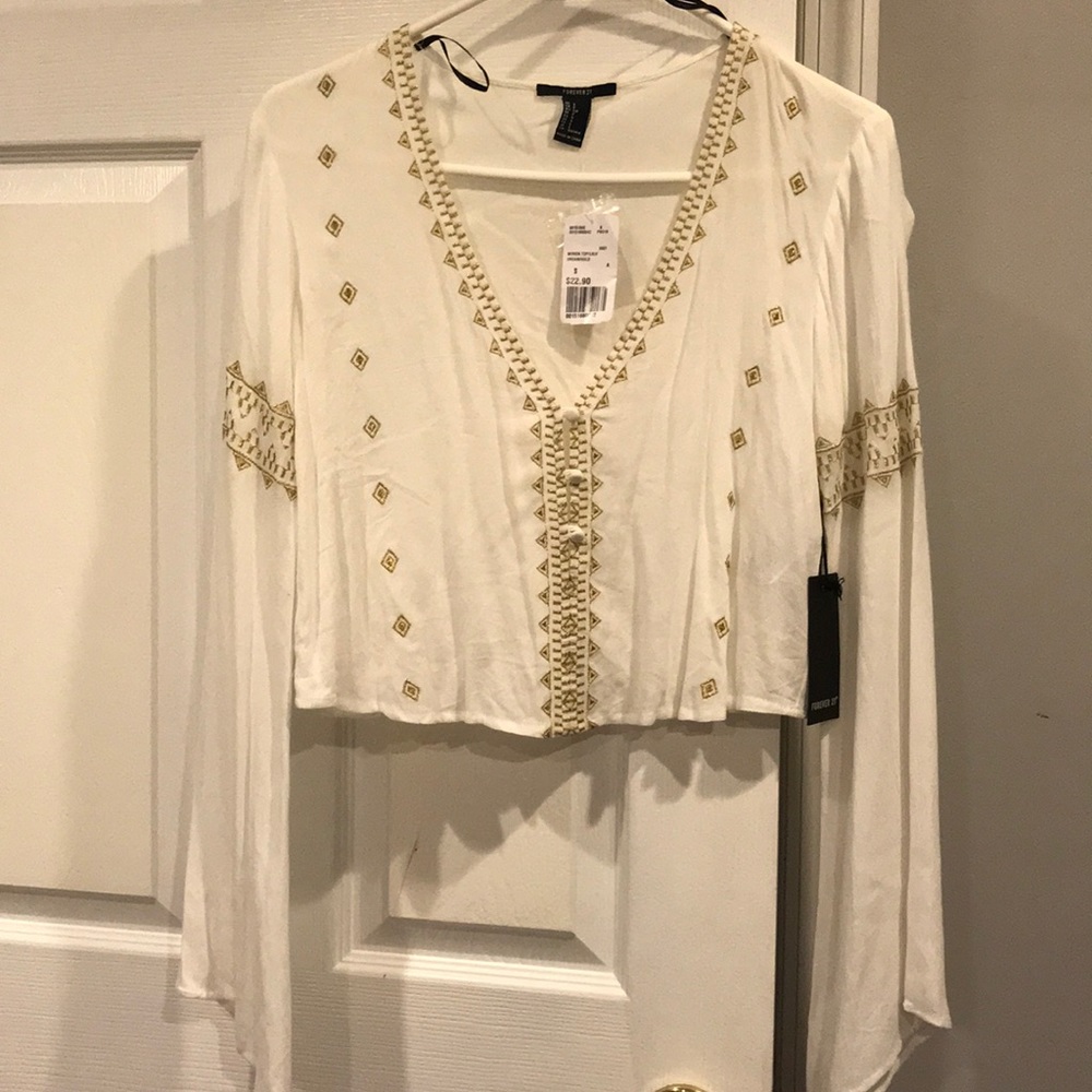White and gold blouse